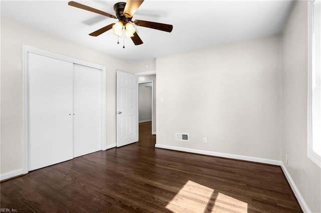 2822 Beachmont Ave, Norfolk, VA 23504 - unfurnished bedroom featuring dark wood-type flooring, a closet, and ceiling fan