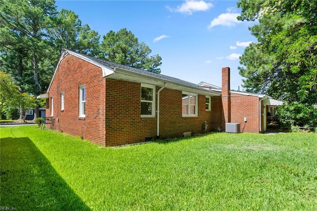 2822 Beachmont Ave, Norfolk, VA 23504 - view of side of home featuring a lawn, brick siding, and a chimney