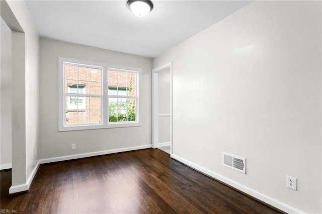 2822 Beachmont Ave, Norfolk, VA 23504 - unfurnished room with dark wood-style flooring and baseboards