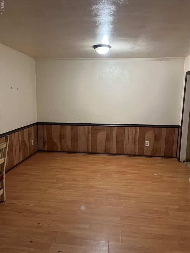 5721 E Hastings Arch, Virginia Beach, VA 23462 - spare room featuring light wood-style flooring and wainscoting