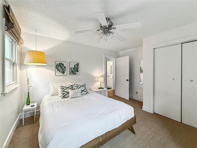 682 Bay Port Rd, Jamaica, VA 23079 - carpeted bedroom with a closet and a ceiling fan