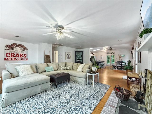 682 Bay Port Rd, Jamaica, VA 23079 - living room featuring a ceiling fan and wood finished floors