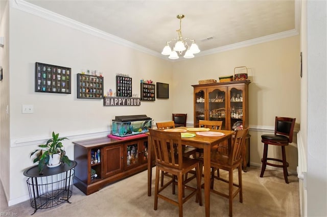 903 Rustads Cir, Williamsburg, VA 23188 - dining space with carpet floors, a chandelier, and crown molding