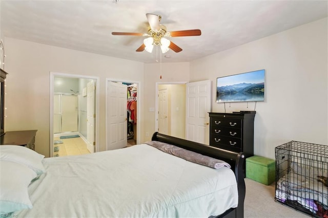 903 Rustads Cir, Williamsburg, VA 23188 - bedroom with a walk in closet, connected bathroom, a ceiling fan, and a closet