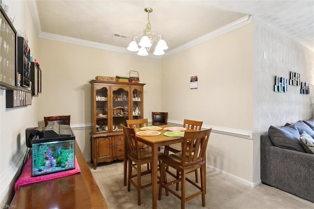 903 Rustads Cir, Williamsburg, VA 23188 - dining area with light colored carpet, a chandelier, and crown molding