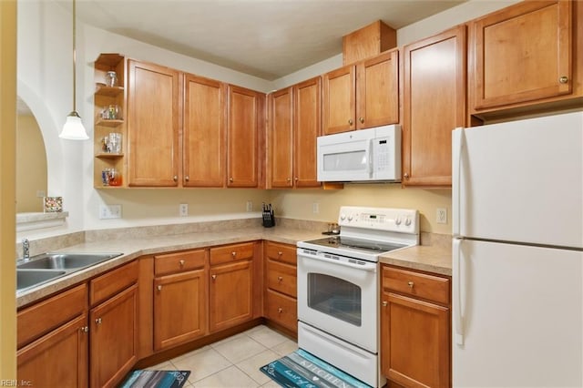 903 Rustads Cir, Williamsburg, VA 23188 - kitchen featuring white appliances, open shelves, light tile patterned floors, light countertops, and arched walkways