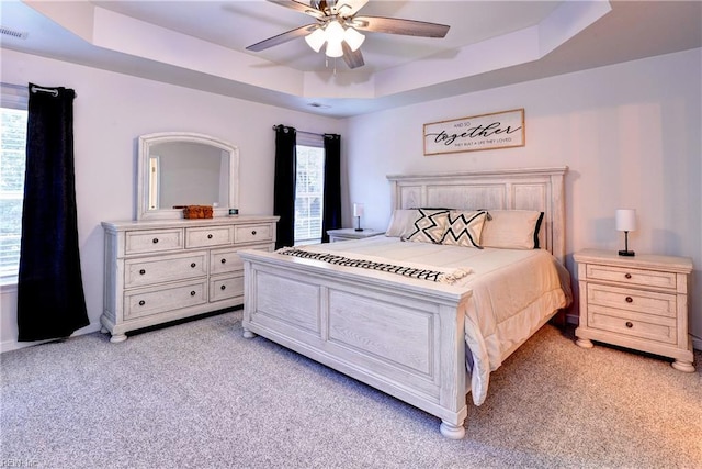 109 Yacht Ct, Williamsburg, VA 23185 - bedroom featuring a raised ceiling, light colored carpet, and ceiling fan