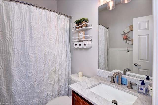 109 Yacht Ct, Williamsburg, VA 23185 - bathroom with vanity, a wainscoted wall, and curtained shower