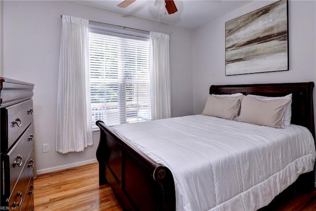 109 Yacht Ct, Williamsburg, VA 23185 - bedroom with multiple windows, light wood-style floors, and ceiling fan