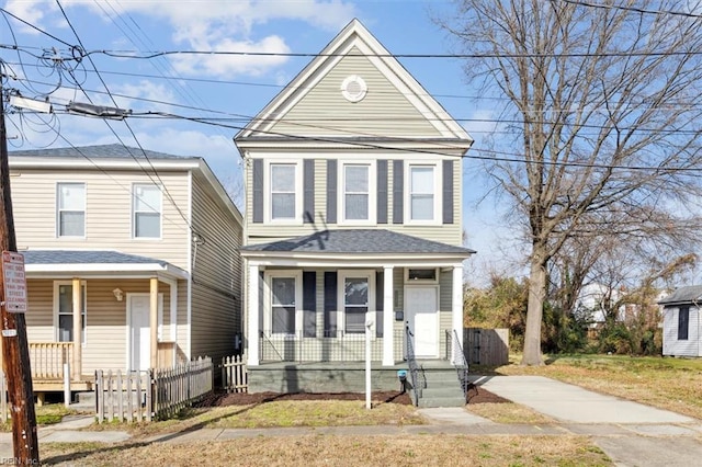 1145 24th St, Newport News, VA 23607 - view of front facade featuring a porch and a shingled roof