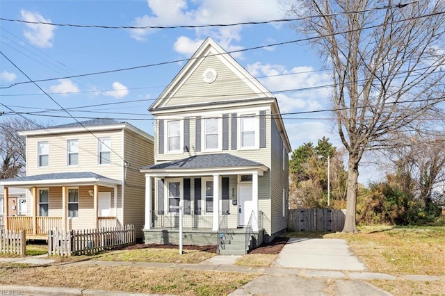1145 24th St, Newport News, VA 23607 - traditional-style home featuring a porch, a shingled roof, and a gate