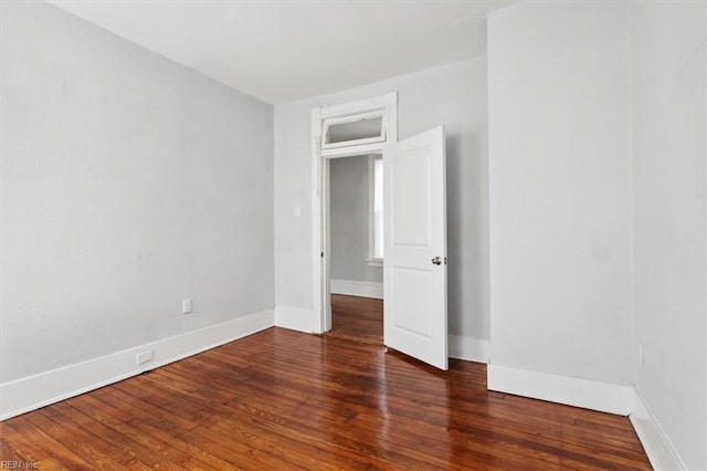 1145 24th St, Newport News, VA 23607 - unfurnished bedroom featuring wood finished floors and baseboards