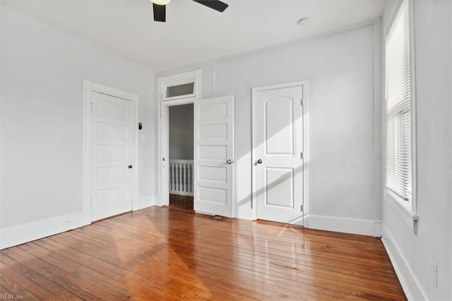1145 24th St, Newport News, VA 23607 - unfurnished bedroom featuring wood-type flooring and ceiling fan