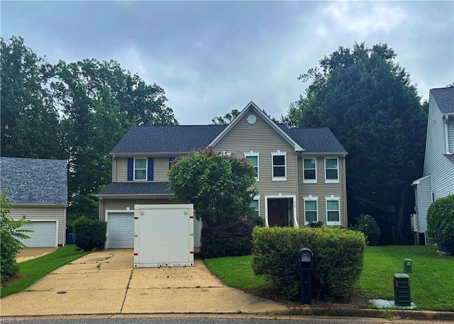 215 Erin Leigh Cir, Newport News, VA 23602 - view of front of property with concrete driveway, a garage, and a front lawn