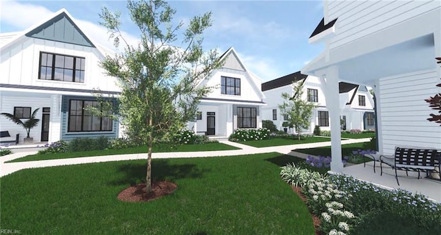 912 Koonce Ln, Chesapeake, VA 23322 - view of front of property featuring a front lawn and board and batten siding
