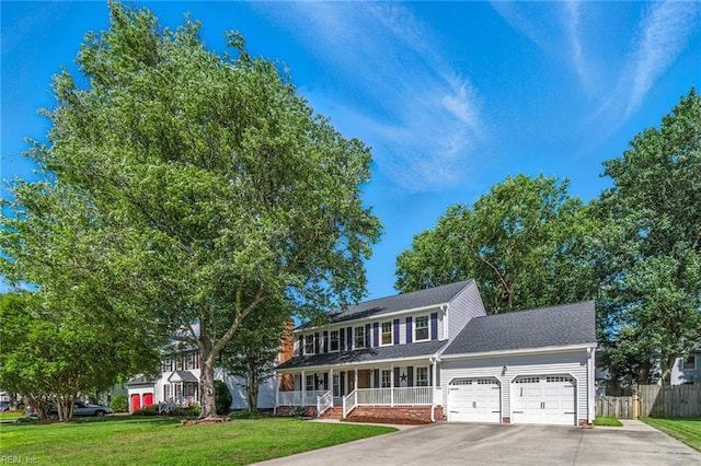 1628 Hawks Bill Dr, Virginia Beach, VA 23464 - colonial inspired home featuring covered porch, an attached garage, and concrete driveway