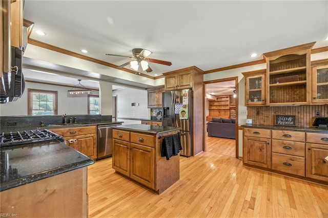 1628 Hawks Bill Dr, Virginia Beach, VA 23464 - kitchen with stainless steel appliances, ceiling fan, ornamental molding, brown cabinets, and light wood-type flooring