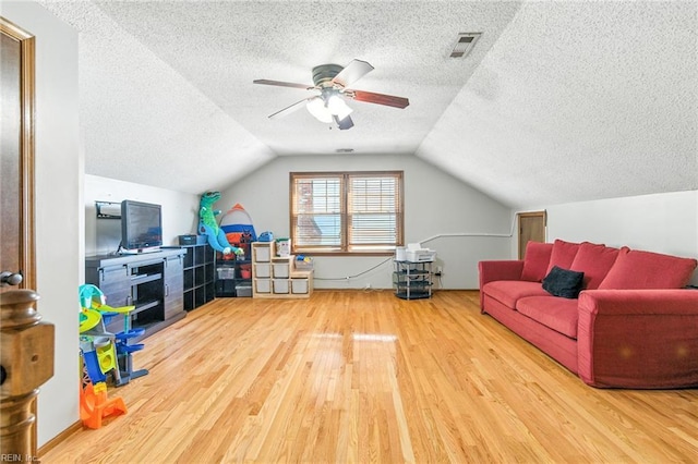 1628 Hawks Bill Dr, Virginia Beach, VA 23464 - playroom with wood finished floors, a textured ceiling, ceiling fan, and vaulted ceiling