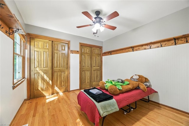 1628 Hawks Bill Dr, Virginia Beach, VA 23464 - bedroom with two closets, light wood-type flooring, and a ceiling fan