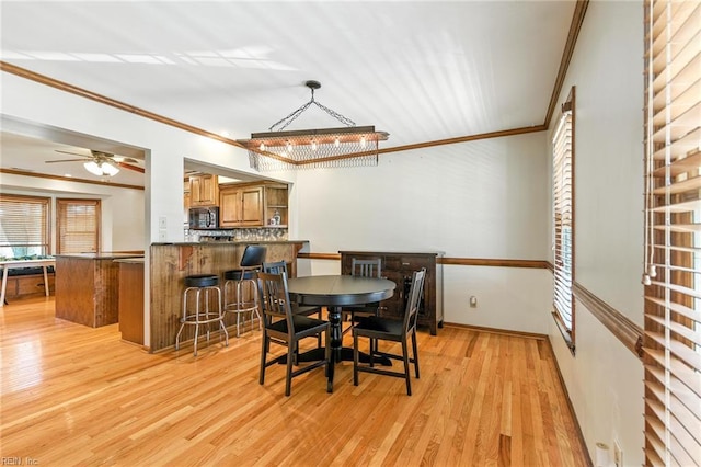 1628 Hawks Bill Dr, Virginia Beach, VA 23464 - dining area with crown molding, light wood-type flooring, and ceiling fan