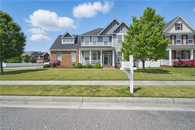 2137 Bellflower Way, Chesapeake, VA 23323 - view of front of house with a porch, board and batten siding, and a front yard