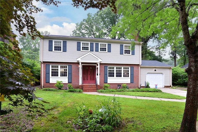 112 Archer Rd, Newport News, VA 23606 - colonial house with an attached garage, brick siding, a front lawn, and driveway