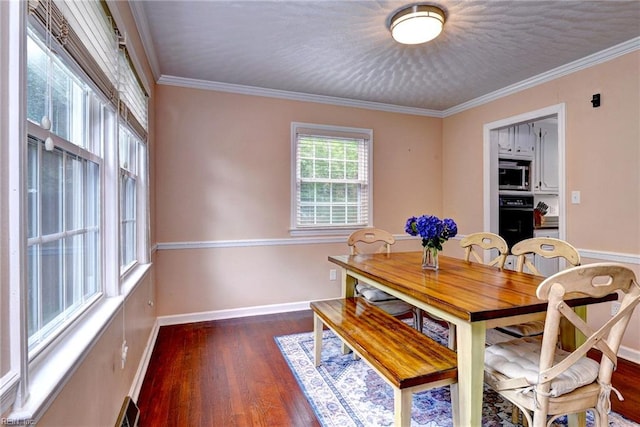 112 Archer Rd, Newport News, VA 23606 - dining space with wood finished floors and crown molding