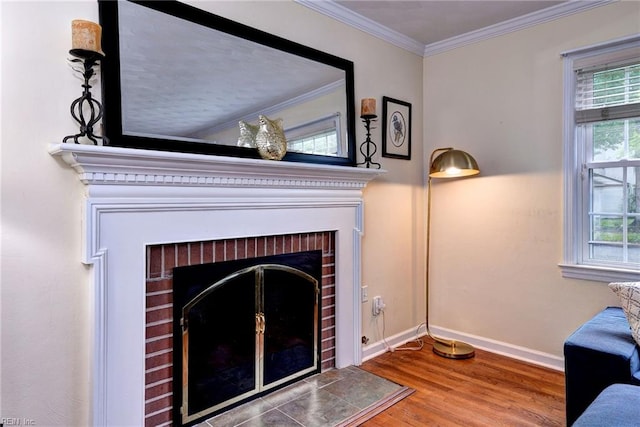 112 Archer Rd, Newport News, VA 23606 - detailed view of a fireplace, wood finished floors, and crown molding