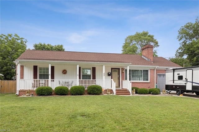 12 Sylvia Ln, Newport News, VA 23602 - ranch-style home featuring covered porch, a chimney, a garage, and brick siding