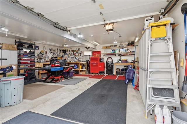 12 Sylvia Ln, Newport News, VA 23602 - garage featuring a workshop area and a garage door opener