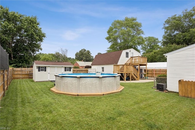 12 Sylvia Ln, Newport News, VA 23602 - fenced backyard featuring a wooden deck, stairway, and a shed