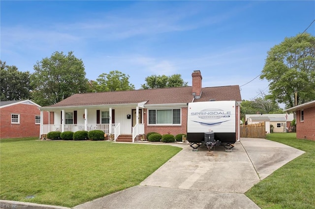 12 Sylvia Ln, Newport News, VA 23602 - single story home featuring covered porch, concrete driveway, a chimney, and brick siding