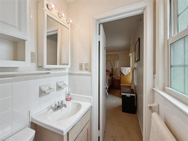 12 Sylvia Ln, Newport News, VA 23602 - bathroom featuring vanity and tile walls