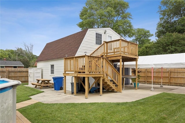 12 Sylvia Ln, Newport News, VA 23602 - back of house featuring a deck, a shingled roof, a fenced backyard, and stairs