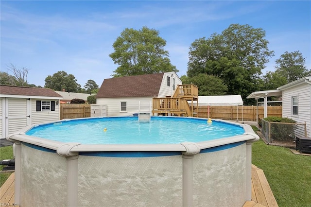 12 Sylvia Ln, Newport News, VA 23602 - view of pool with a storage unit and a wooden deck