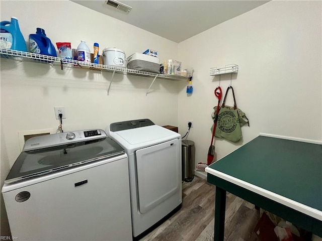 120 Lancelot Dr, Suffolk, VA 23434 - laundry room with separate washer and dryer and wood finished floors