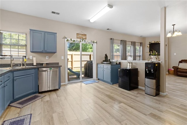 3904 River Breeze Cir, Chesapeake, VA 23321 - kitchen featuring dishwasher, light wood-style flooring, blue cabinetry, and dark countertops