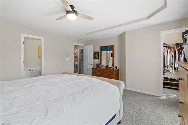 3904 River Breeze Cir, Chesapeake, VA 23321 - bedroom with a walk in closet, a raised ceiling, carpet, connected bathroom, and a closet