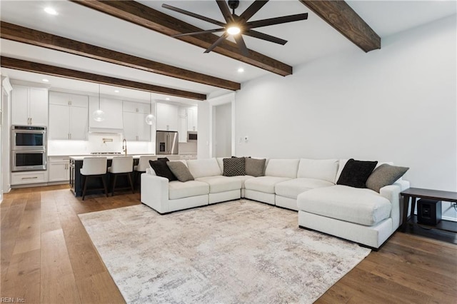 104 Tucker Ct, Carrollton, VA 23314 - living room with a ceiling fan, beam ceiling, wood finished floors, and recessed lighting