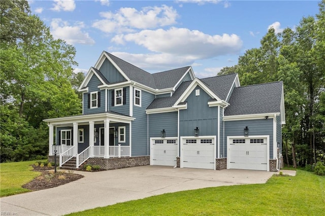 104 Tucker Ct, Carrollton, VA 23314 - craftsman house featuring board and batten siding, a porch, driveway, and a front yard