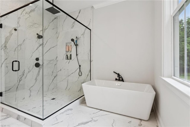 104 Tucker Ct, Carrollton, VA 23314 - bathroom with a freestanding tub, marble tiled floors, and a marble finish shower