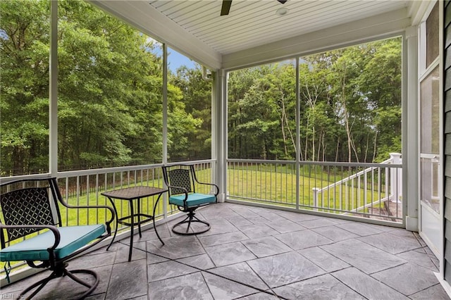 104 Tucker Ct, Carrollton, VA 23314 - sunroom with a ceiling fan, plenty of natural light, and view of scattered trees