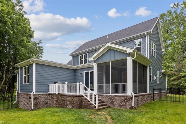 104 Tucker Ct, Carrollton, VA 23314 - back of property with a sunroom, brick siding, ceiling fan, and a deck