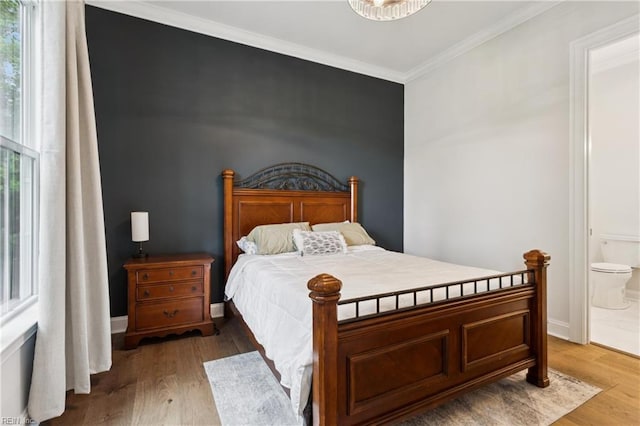104 Tucker Ct, Carrollton, VA 23314 - bedroom with wood finished floors, crown molding, and ensuite bathroom