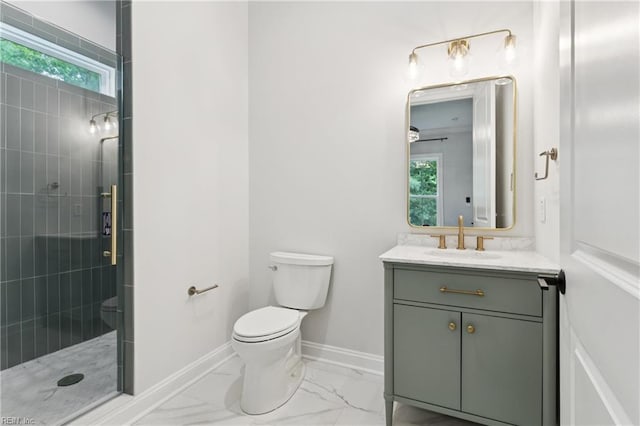 104 Tucker Ct, Carrollton, VA 23314 - bathroom featuring vanity, a tile shower, and marble look tiles