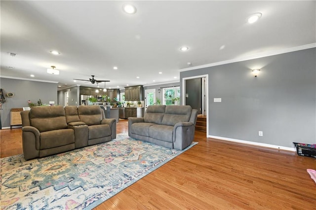 16 Inglewood Dr, Hampton, VA 23666 - living area featuring crown molding, recessed lighting, light wood finished floors, and a ceiling fan