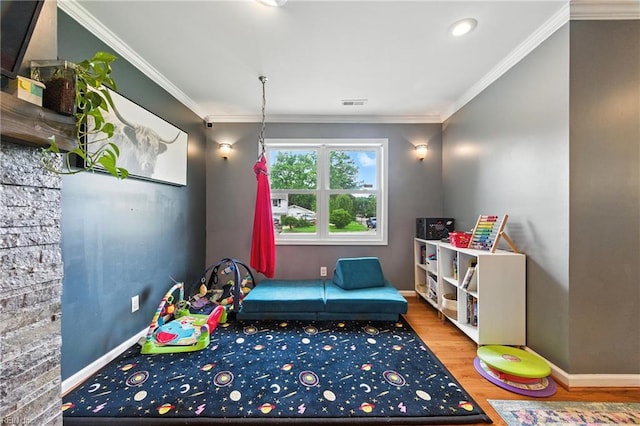 16 Inglewood Dr, Hampton, VA 23666 - recreation room featuring wood finished floors, ornamental molding, and recessed lighting