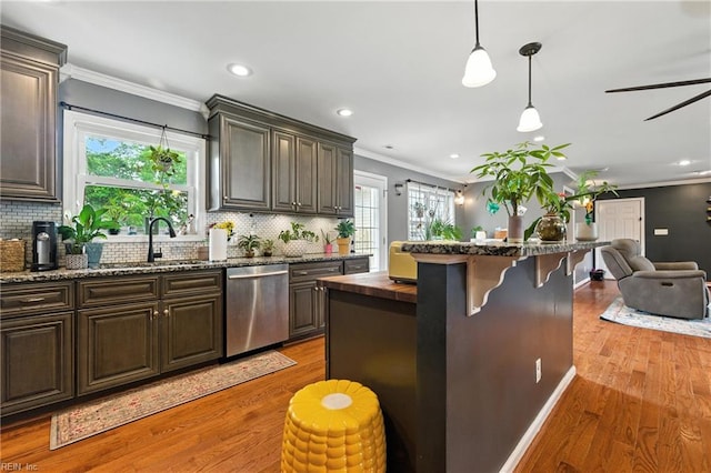 16 Inglewood Dr, Hampton, VA 23666 - kitchen with stainless steel dishwasher, light wood-type flooring, ornamental molding, open floor plan, and decorative backsplash