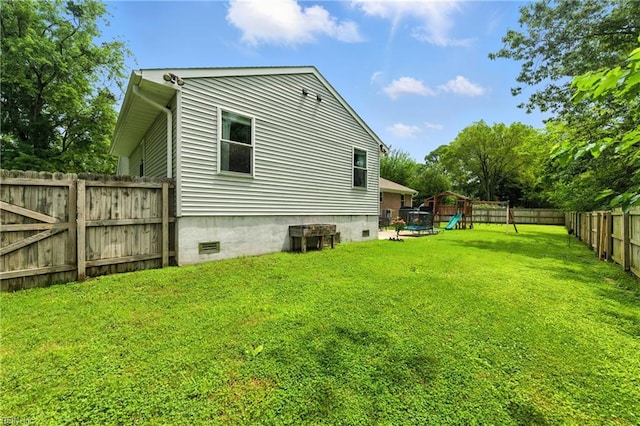 16 Inglewood Dr, Hampton, VA 23666 - rear view of property with a playground, a fenced backyard, and crawl space