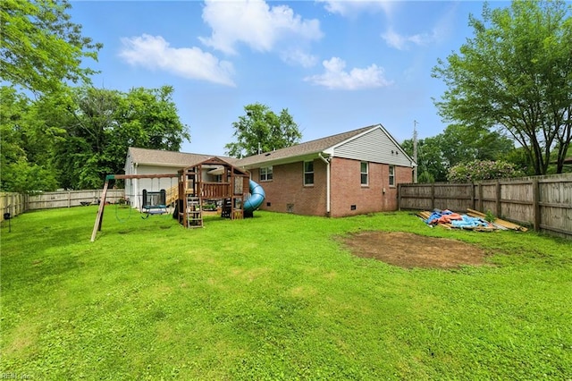 16 Inglewood Dr, Hampton, VA 23666 - back of house with a playground, a fenced backyard, crawl space, and brick siding